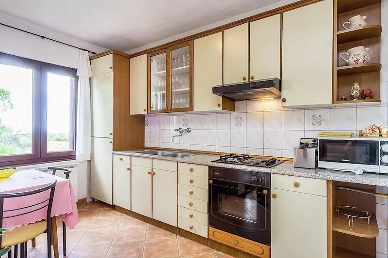 Apartment in private house, with football field
