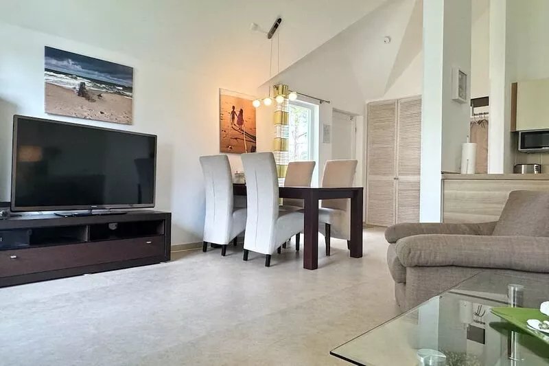 Familienfreundliches Apartment mit Infrarotsauna, Kamin & Balkon in Strandnähe