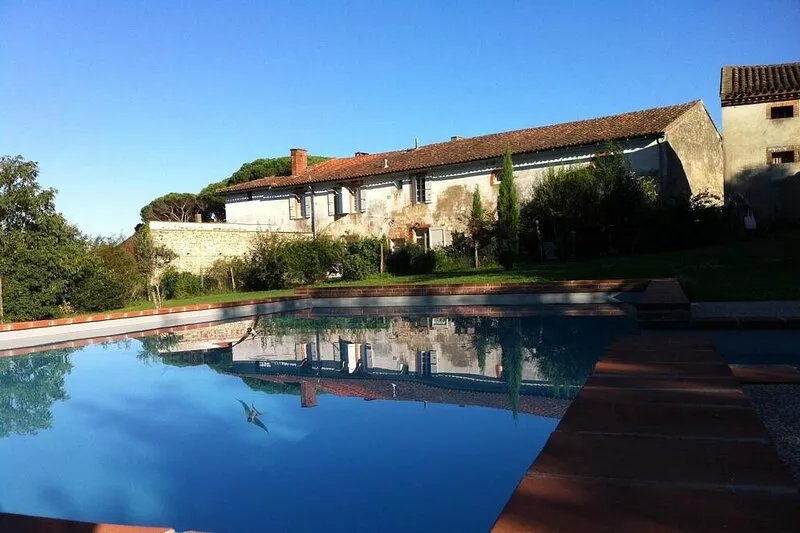 FarmHouse with character facing the Pyrenees mountains