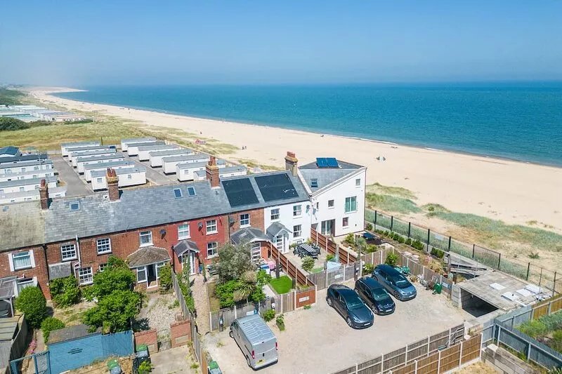 Step ONTO the beach * Number One Beachfront home
