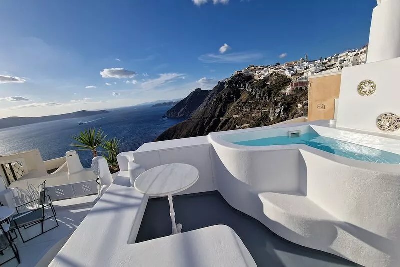 Elegant two-bedroom duplex  with hot tub, Caldera view and swimming pool
