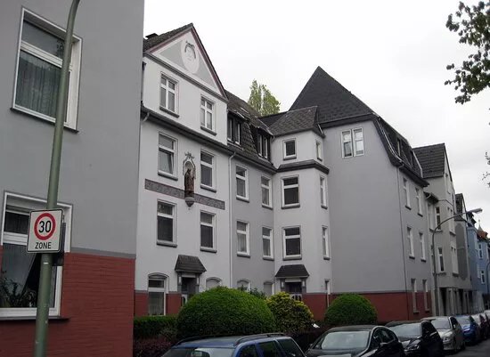 Denkmal: Heiliger Eligius am Wohnhaus in Duisburg Laar.