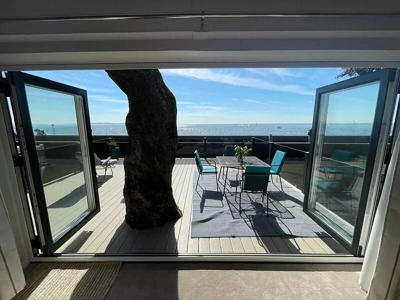 'the Chalet by the Sea , Under the Tree"