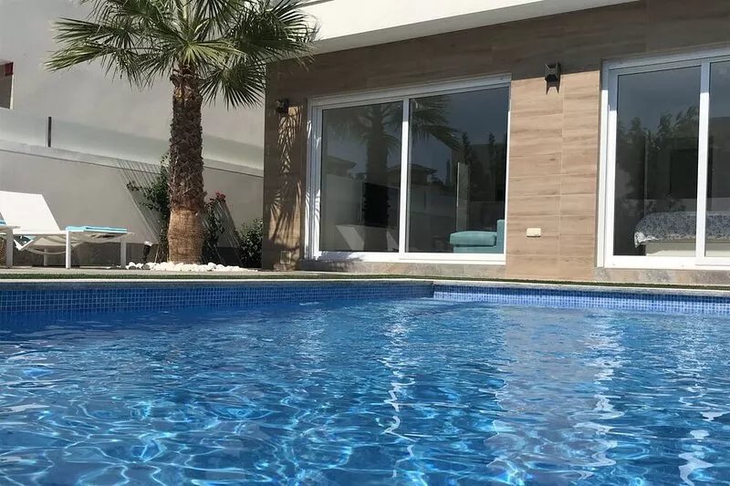 Contemporary new villa with private swimming pool and close to beaches