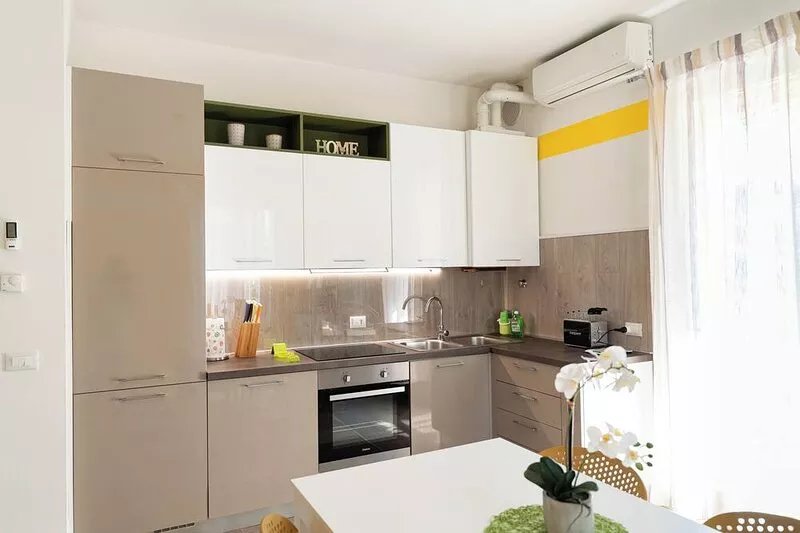 Bright two-room apartment with private terrace and garden