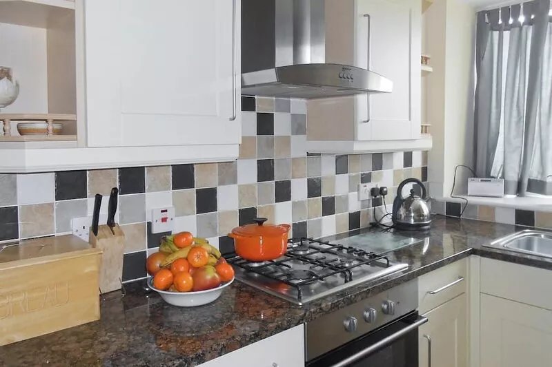 Under 2 miles from the bustling harbour town of Padstow, and with superb sandy