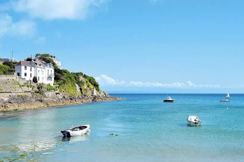 A charming property in an enviable location with panoramic sea views across the