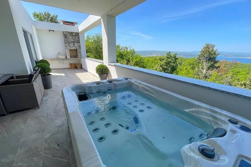 Modern holiday home with bubble bath , sauna and sea view
