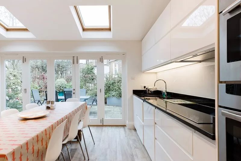 Central, stylish London family townhouse with private terrace on quiet street