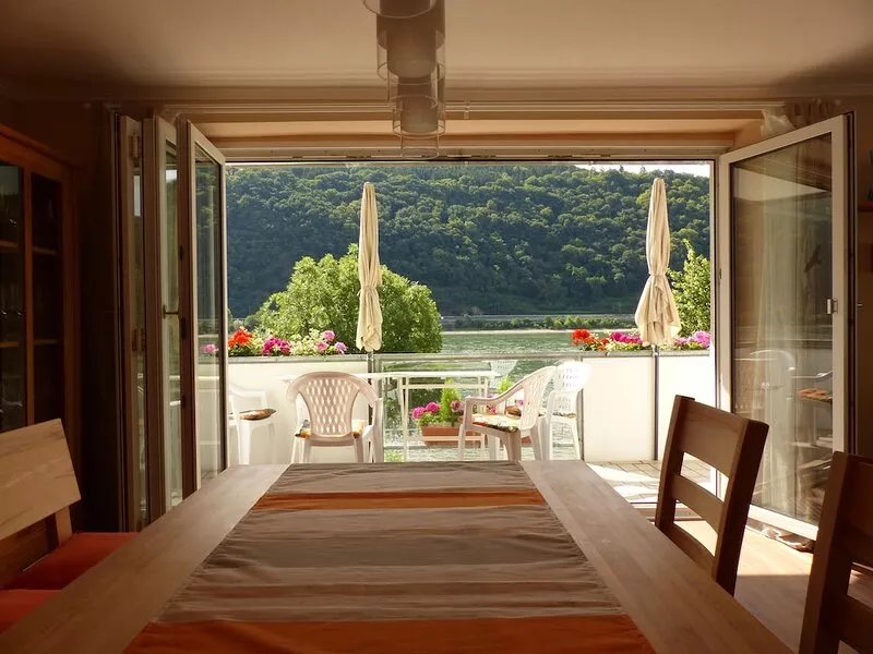 Stylish holiday home right on the Rhine with a dream view
