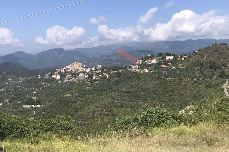 Panoramic view of the Mediterranean Sea and the Ligurian mountains.