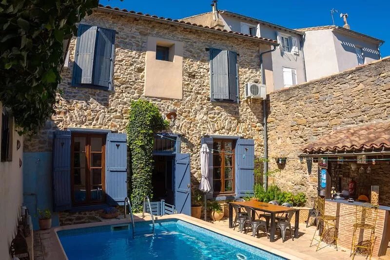 VERY NICE STONE TOWN HOUSE WITH HEATED POOL