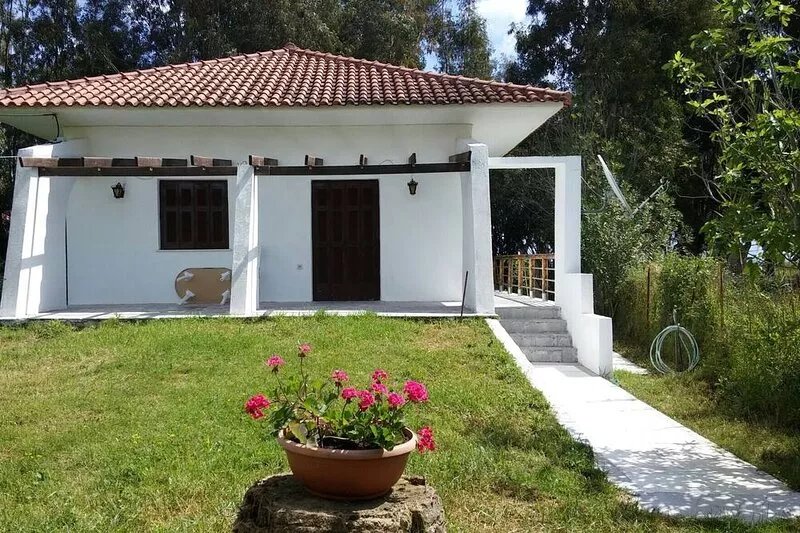Beach Villa. Direct sea access, family friendly, lg veranda, garden, in village.