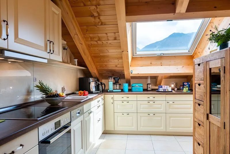 Open top floor apartment with exposed roof structure
