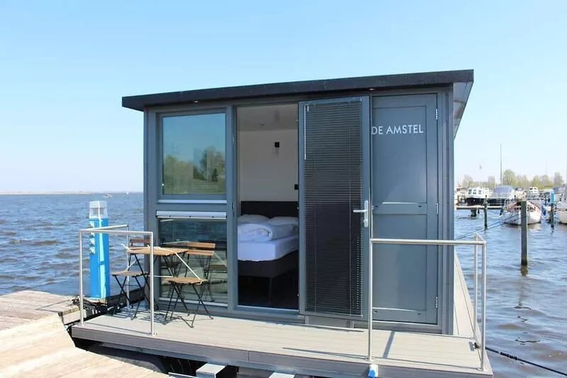 Cozy houseboat at the edge of the marina