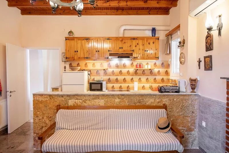 Green Walnut Home in Ano Korakiana is surrounded by nature on a quiet area.