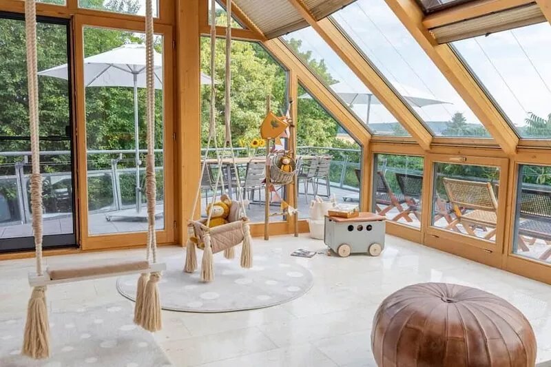 Vacation home with conservatory, garden, fenced property, fireplace in