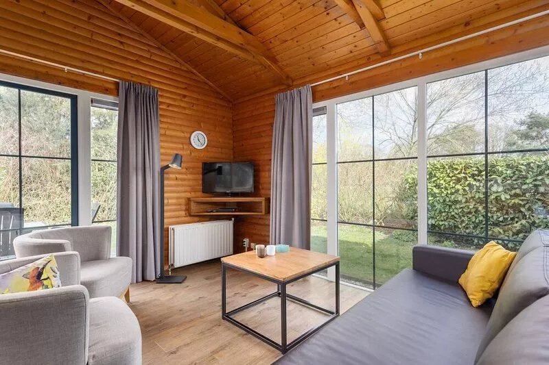 Wooden bungalow with dishwasher, 3 km. van Putten