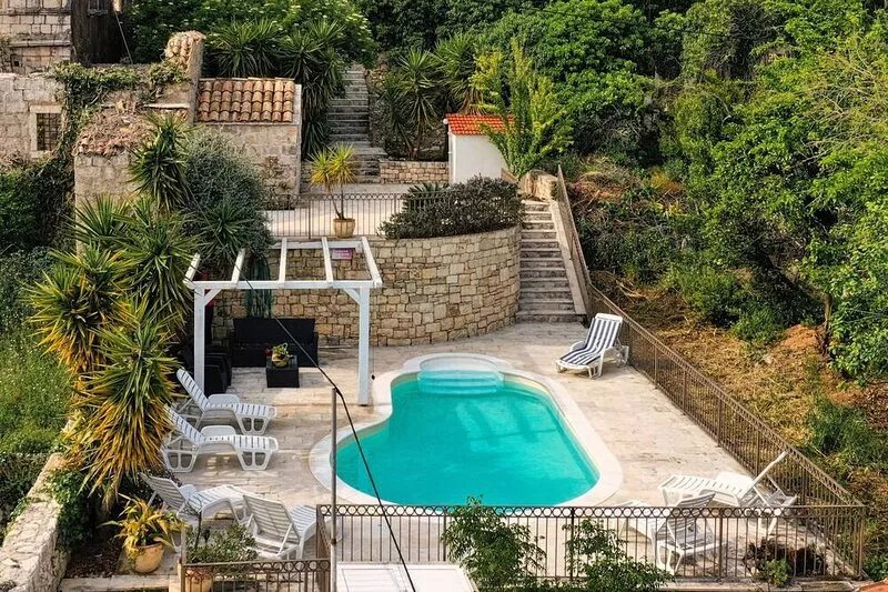 Spacious stone villa with views and private pool, walking distance to the beach