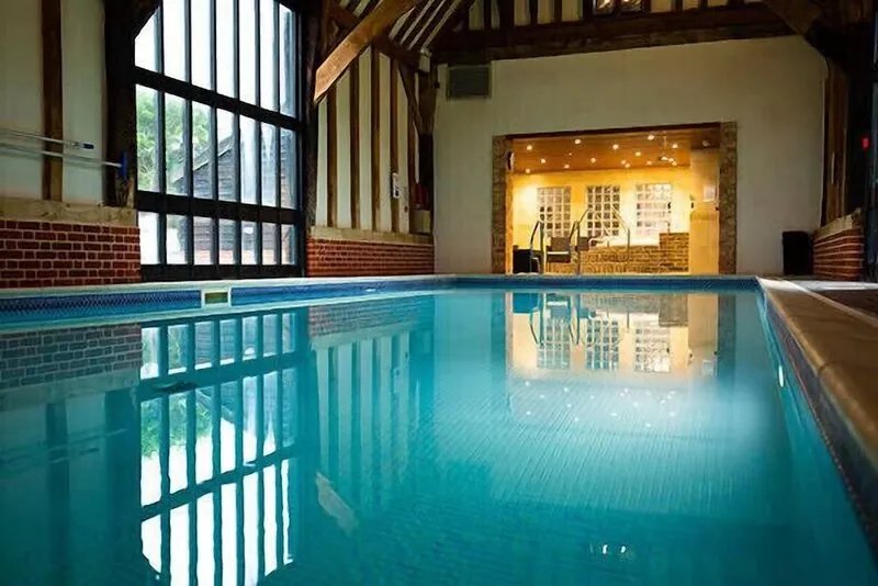 Luxury Scandinavian style lodge with own hot tub & sauna on golf resort.