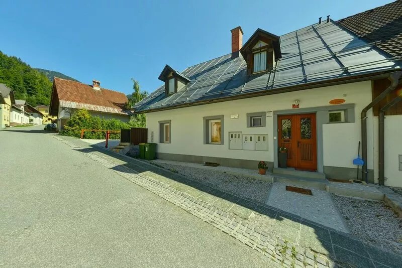Apartment Planica 1 with a garden & a hot tub