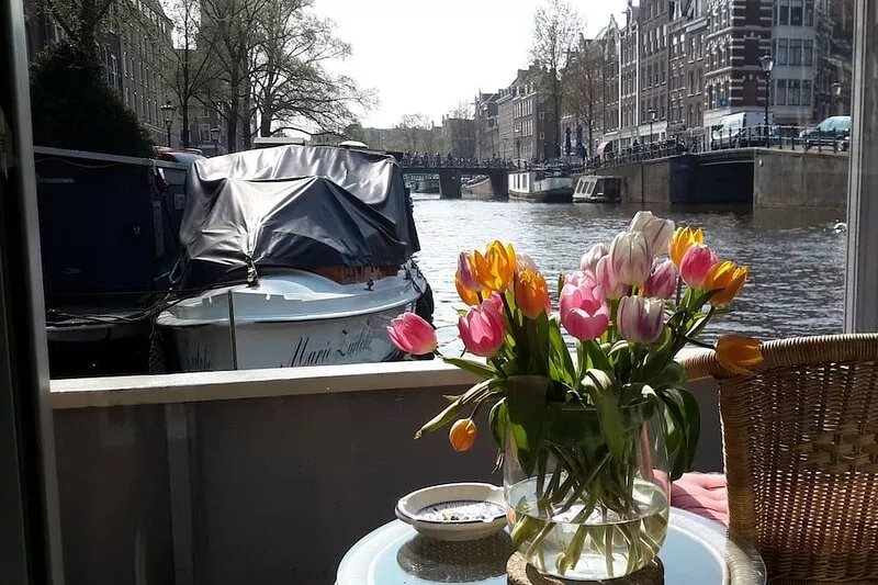 Pantheos Houseboat in Prinsengracht  with a view of the Westerkerk the Landmark.