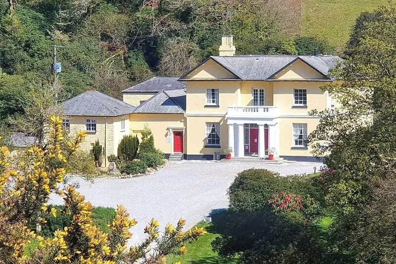 This cottage sits on a beautiful landscaped estate with its own fishing and