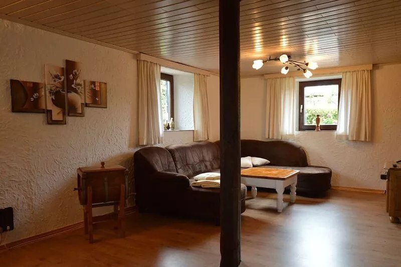 Apartment with garden in a wooded setting.
