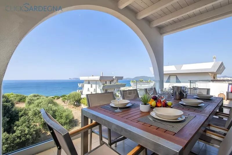Alghero on the sea. Penthouse with incredible view and covered verandas for 9