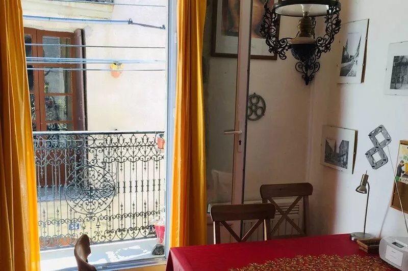 Groovy house from the 16th century with sunny loggia above the rooftops of the