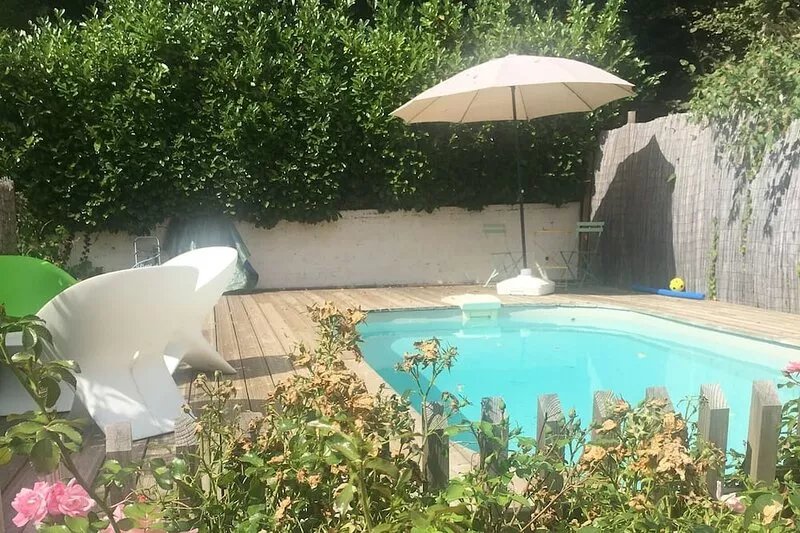 Charming town house with pool and garden