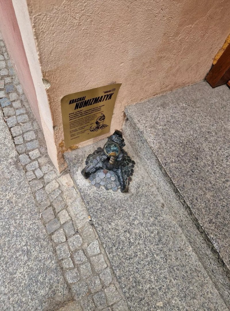 Krasnal Numizmatyk Statue (Wroclaw Dwarf Statue)