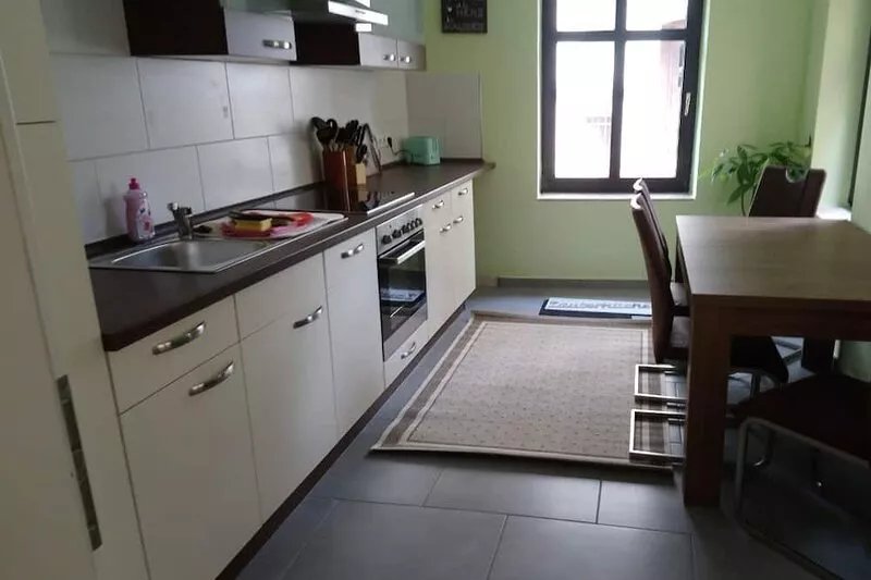 In a green environment located modern and cuddly furnished apartment
