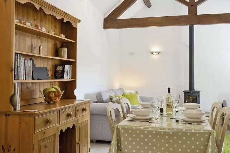Relax in front of the woodburner in this single-storey barn conversion.