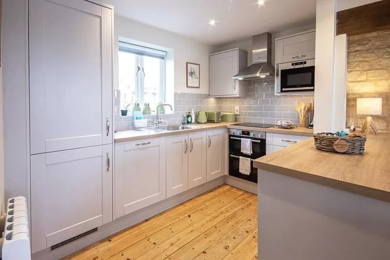 A cotswold stone waterside cottage that sleeps 6 guests  in 3 bedrooms
