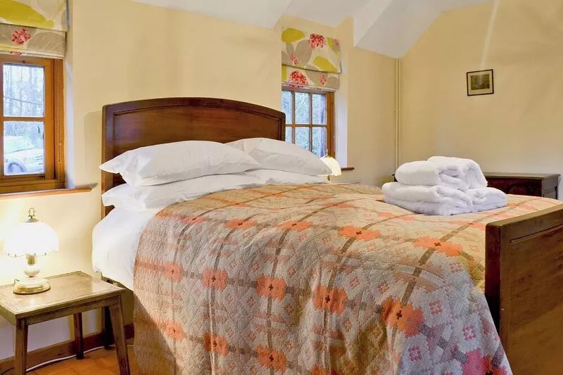 A charming 17th Century farmhouse with mature gardens attracting red squirrels