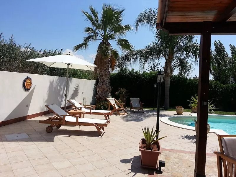 Villa with swimming pool and lawn