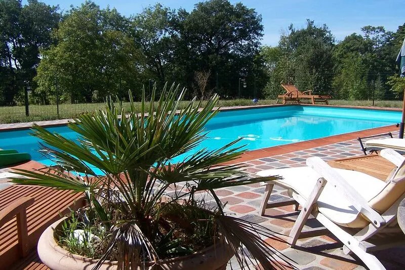 Renovated former farm house, charming, with a pool, park and private garden