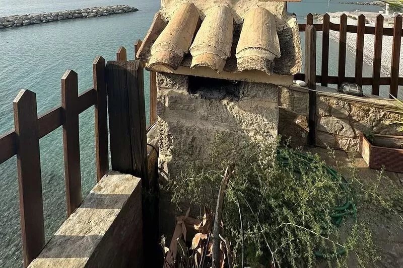 Traditional house over the sea wave