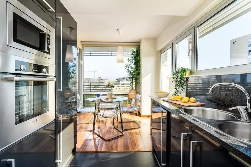 Modern 2-Bedroom Apartment with Balcony & Pool Access Near Forum Beach