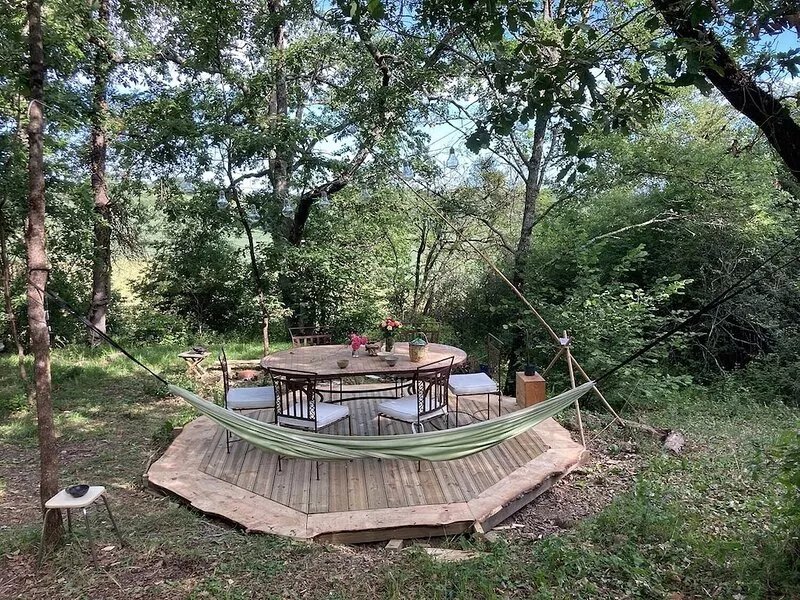 Gypsy Caravan and Wooden Cabin In Nature