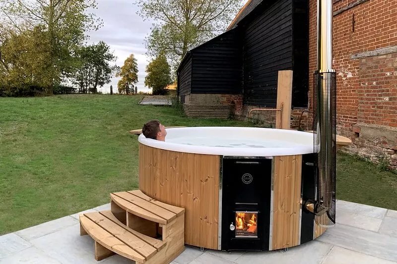 16th century grade II* farmhouse with hot tub and wild swimming
