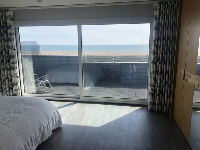 Detached house on Shoreham Beach with private garden and balcony.