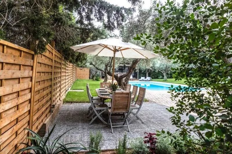 Minimal house with pool and large garden at Varkiza. 5 minutes from the beach!