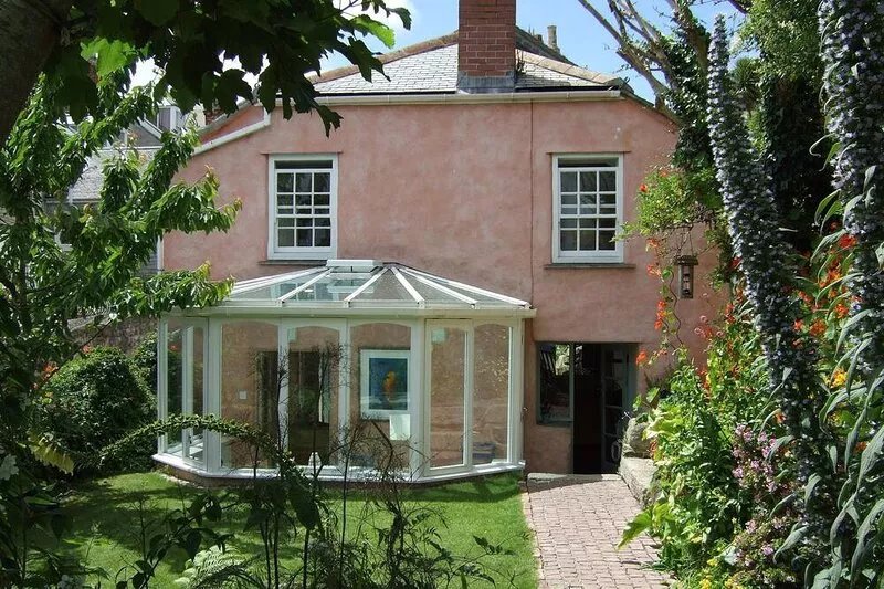 Gorgeous artist's cottage with secluded garden and sea views from all rooms.