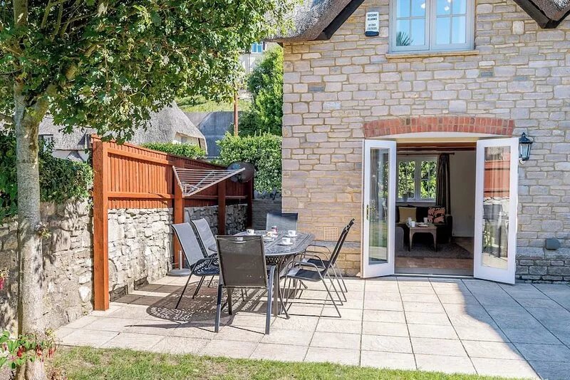 A charming yet contemporary thatched cottage close to Lulworth Cove.