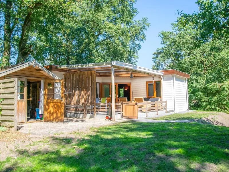 Chalet in the woods with veranda and sauna