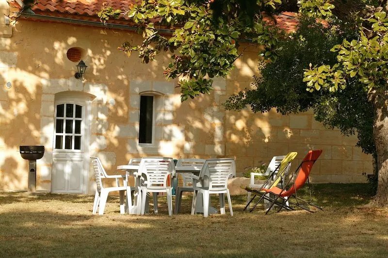 Typical Family house on a Bordeaux winery, overlooking the garden and vines