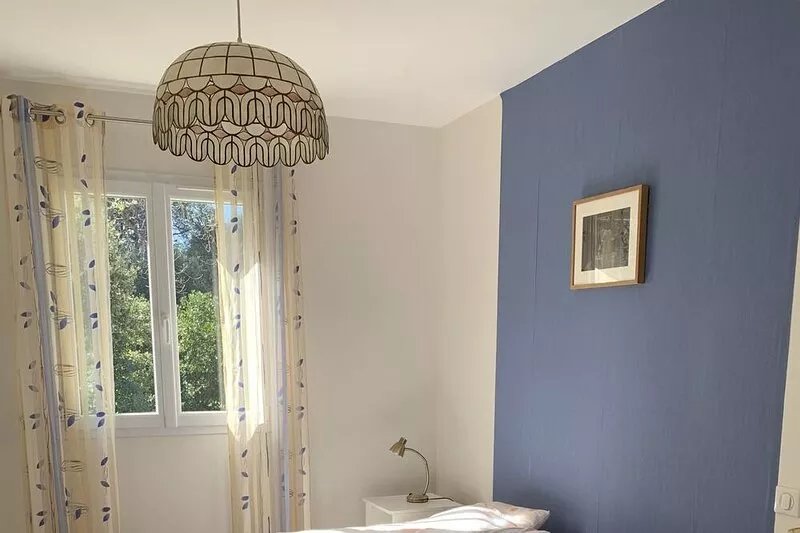 Attractive, recently built detached house set in a garden with swimming pool.