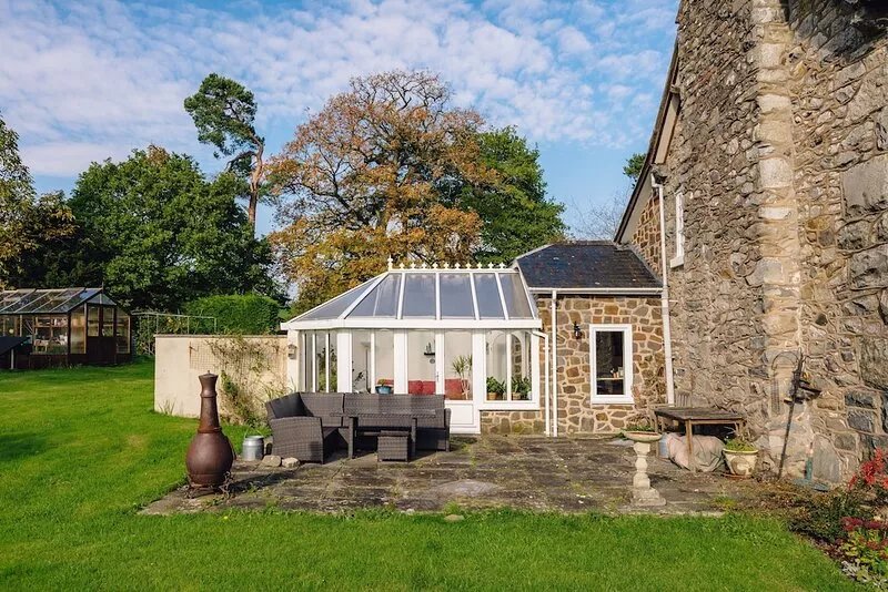 Charming Welsh Farmhouse, natural swimming pool, fabulous views, sleeps to 14